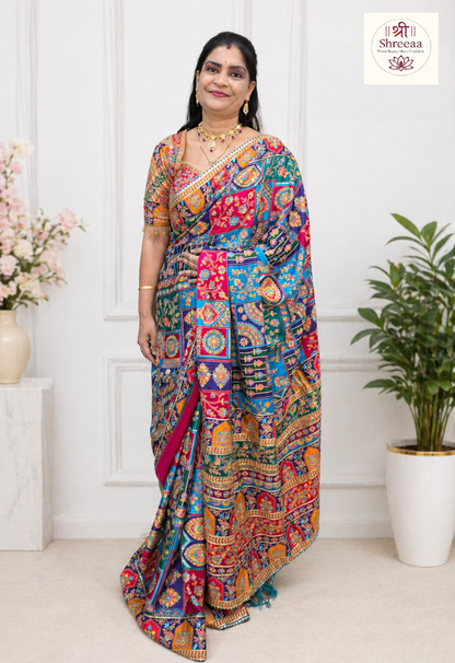 “Royal Phulkari Elegance – Multicolor Mirror Embroidered Saree Set”